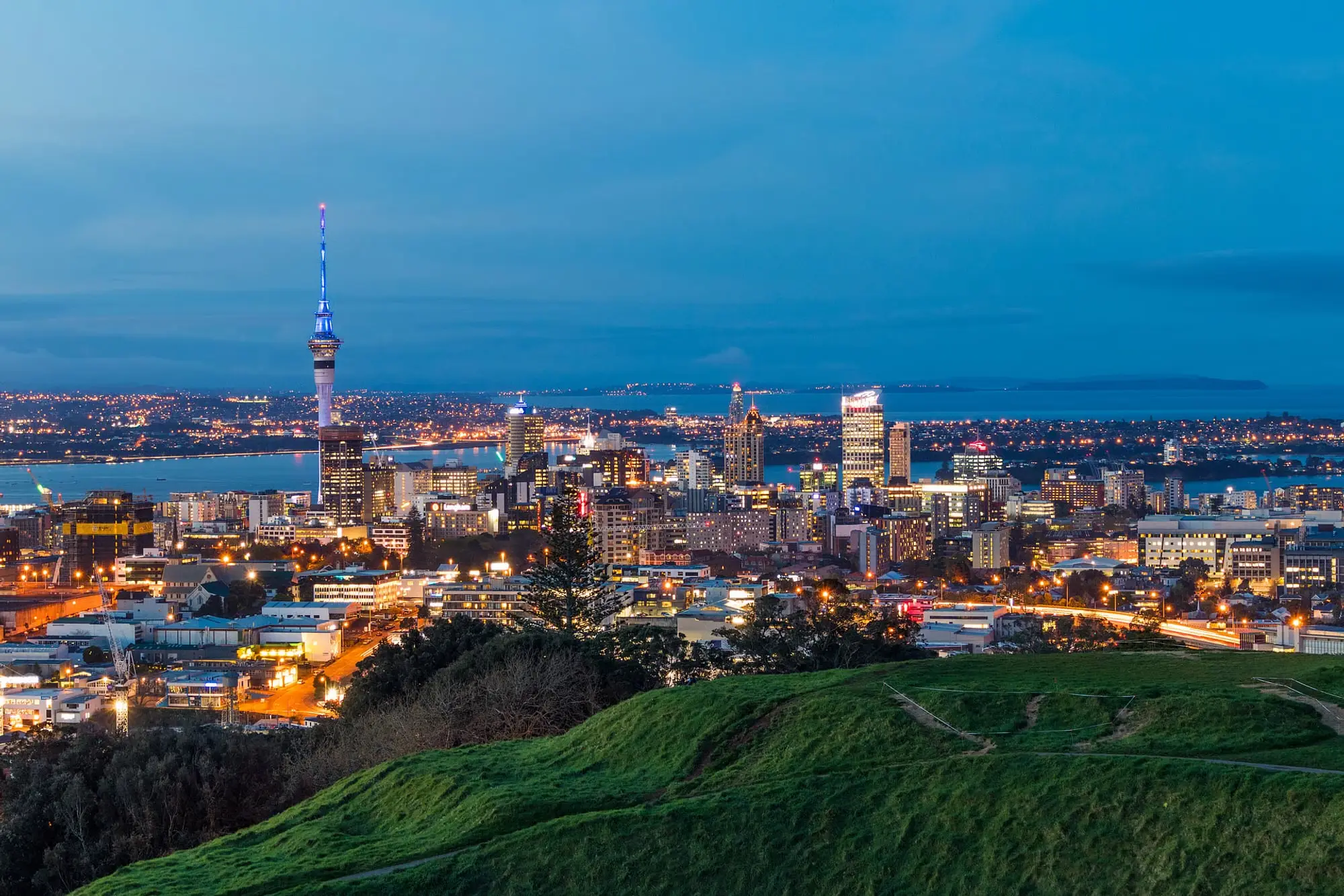 Auckland apartments and city lights at dusk