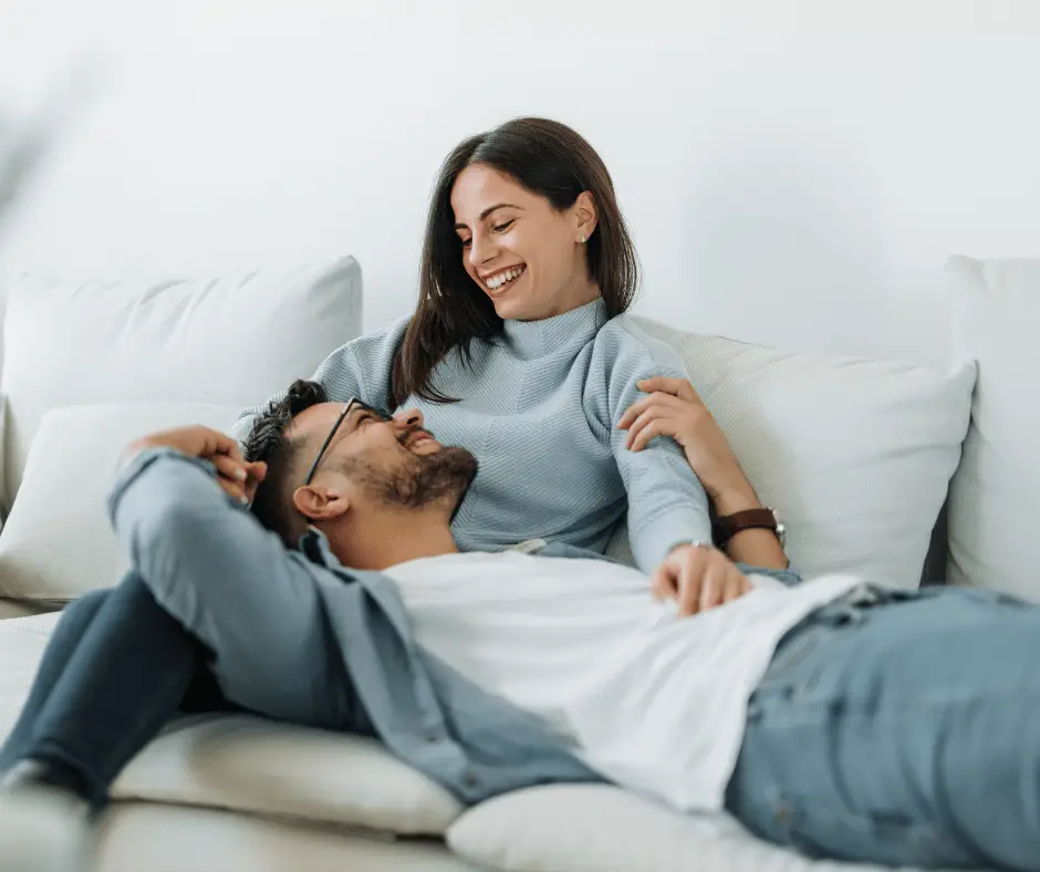 A couple relaxing together at home